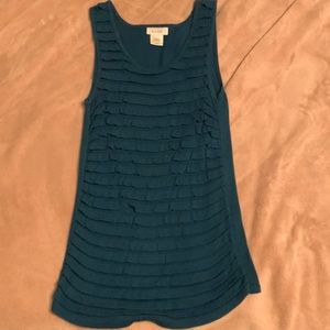 Teal ribbed sleeveless shirt.
